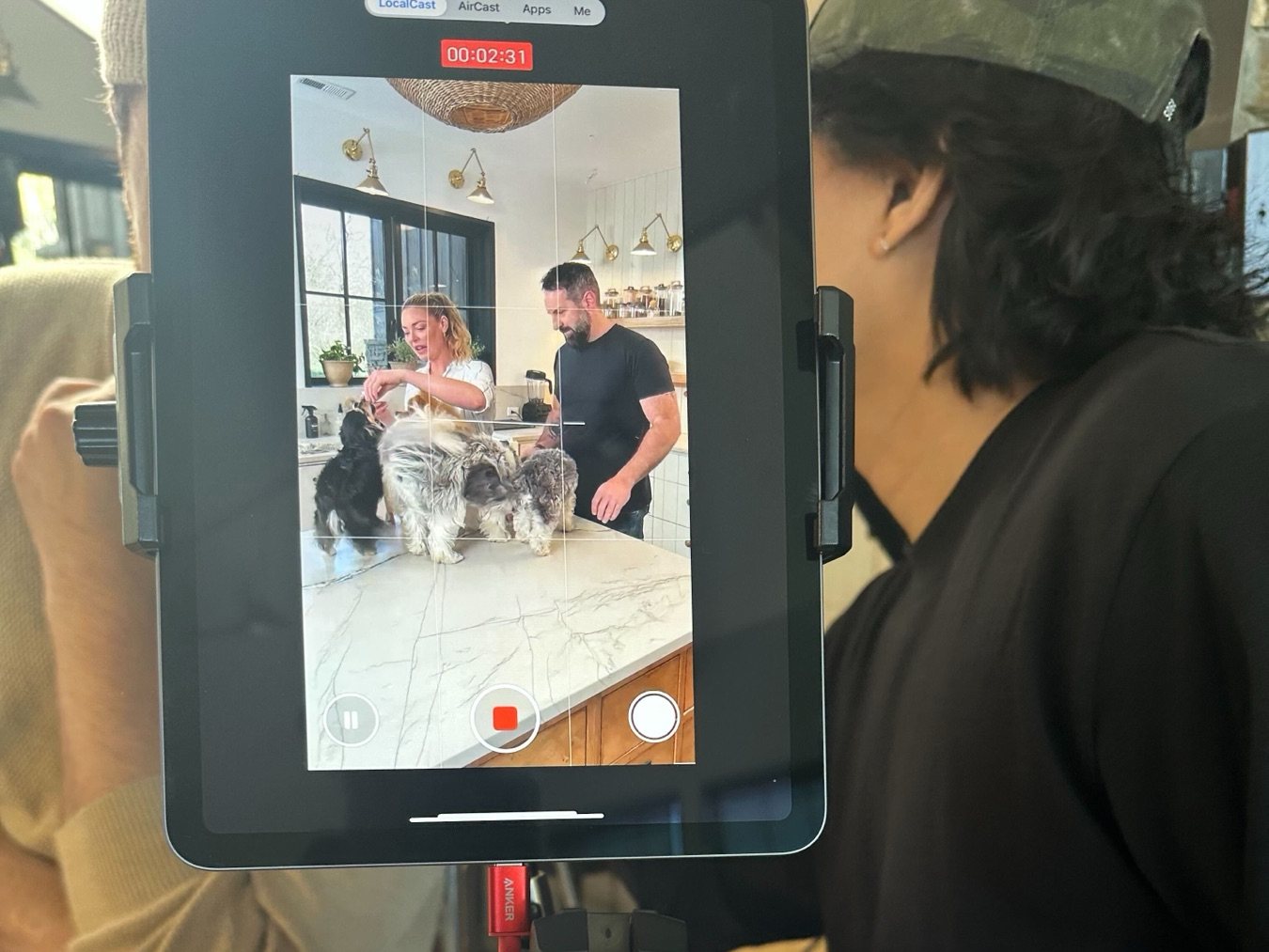 Behind the scenes of a Katherine Heigl content shoot, the Emmy Award-winning actress and Badlands Ranch Brand Champion filming with her dogs in a kitchen
